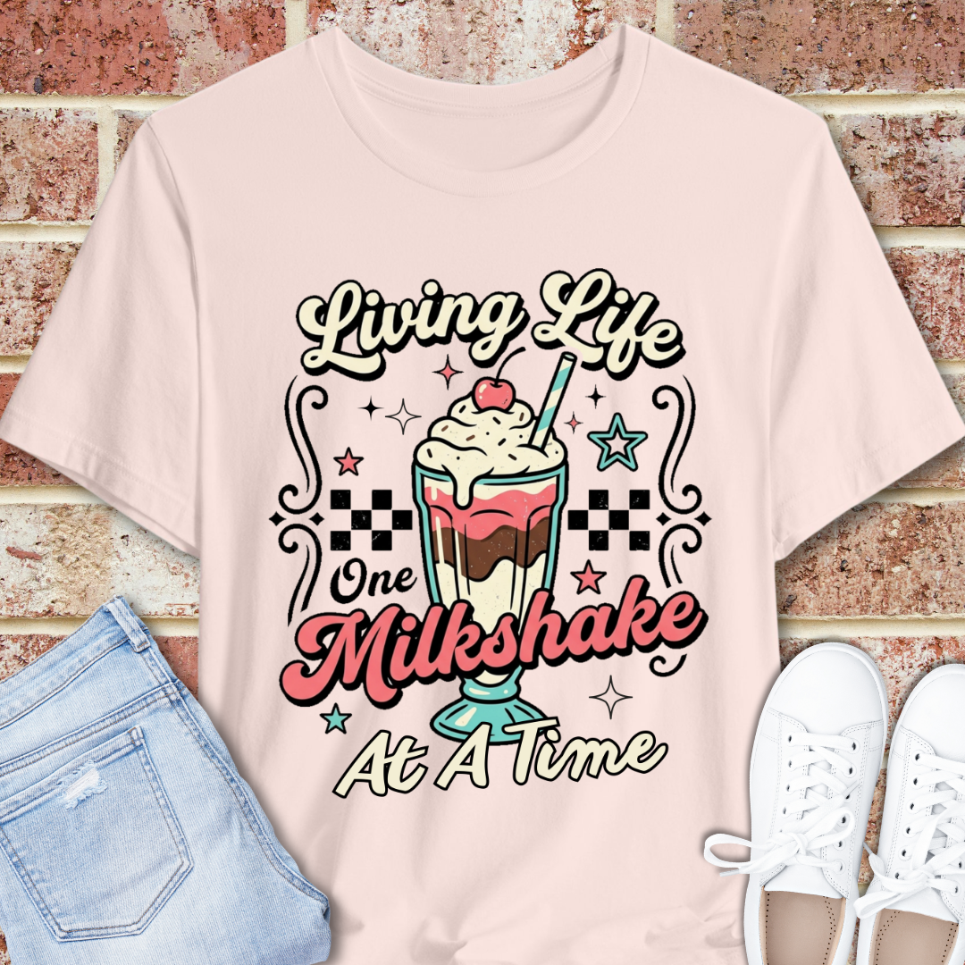 Milkshake Graphic Tee — "Living Life One Milkshake at a Time" Retro Dessert T-Shirt