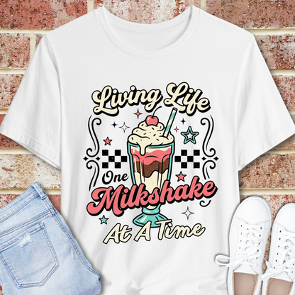 Milkshake Graphic Tee — "Living Life One Milkshake at a Time" Retro Dessert T-Shirt