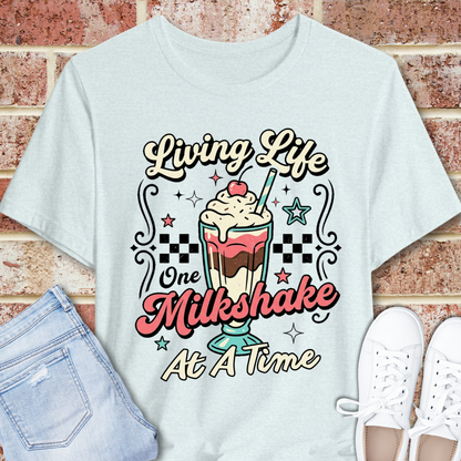 Milkshake Graphic Tee — "Living Life One Milkshake at a Time" Retro Dessert T-Shirt