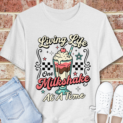 Milkshake Graphic Tee — "Living Life One Milkshake at a Time" Retro Dessert T-Shirt