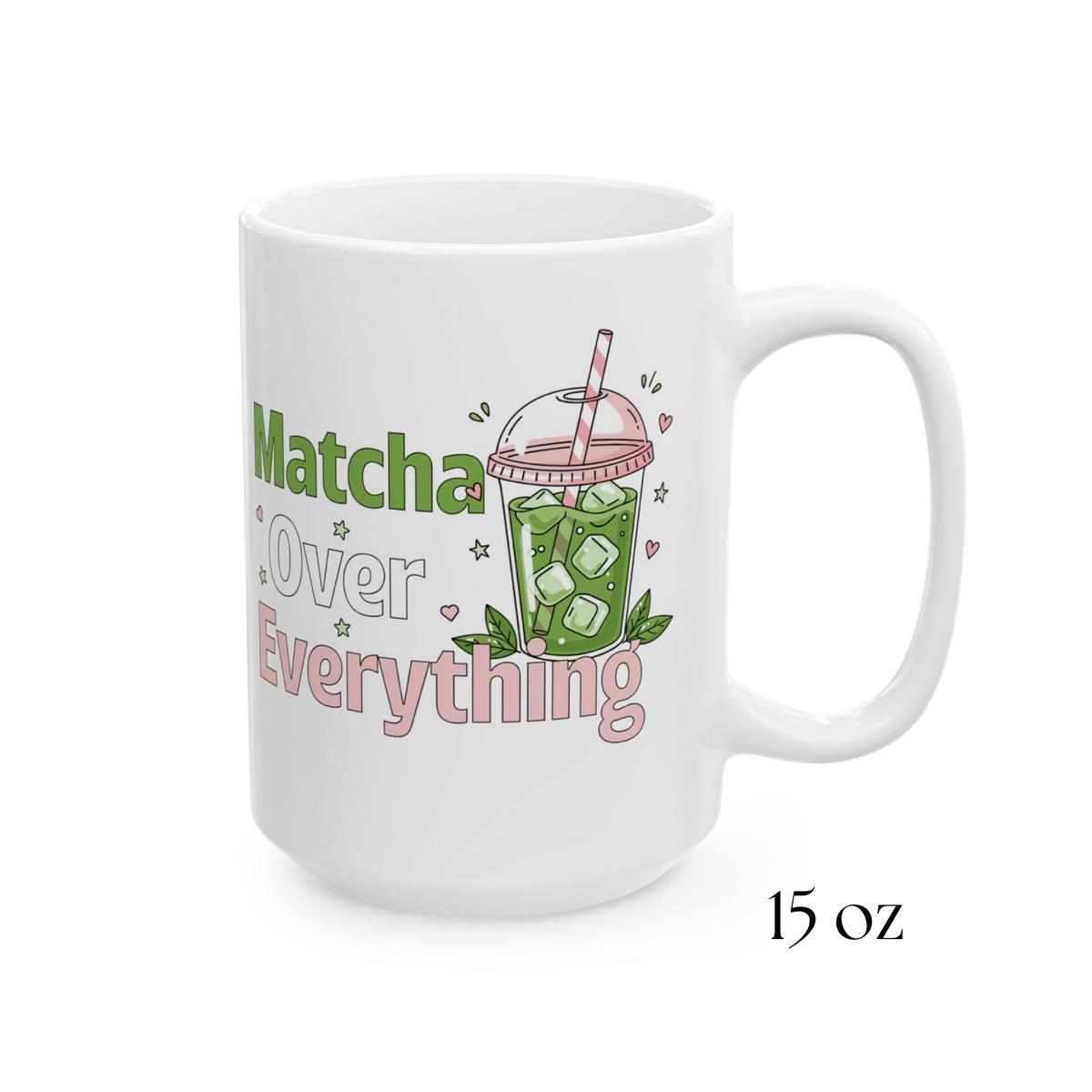 Close-up of a white ceramic matcha mug with an iced matcha latte illustration surrounded by tiny hearts and stars and the text “Matcha Over Everything” 